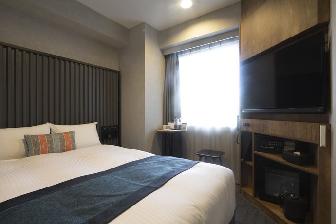 Imagen de la habitación del Hotel The Knot Tokyo Shinjuku. Foto 6