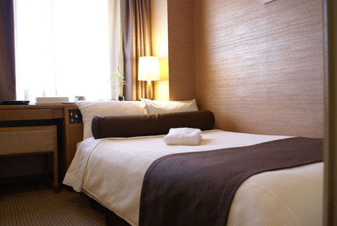 Imagen de la habitación del Hotel The Knot Yokohama. Foto 8