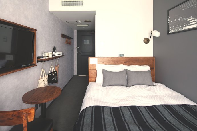 Imagen de la habitación del Hotel The Knot Yokohama. Foto 10