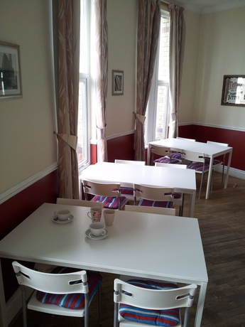 Imagen del bar/restaurante del Hotel The Knowsley B&B. Foto 2