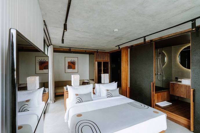 Imagen de la habitación del Hotel The Komu. Foto 5