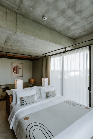 Imagen de la habitación del Hotel The Komu. Foto 12