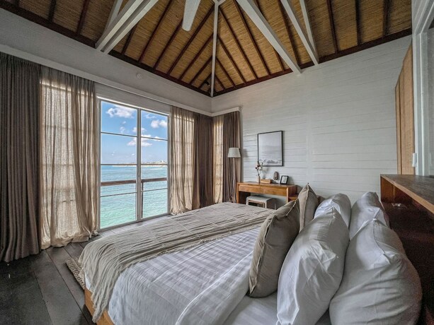 Imagen de la habitación del Hotel The Korowai. Foto 13