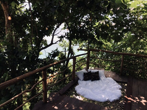 Imagen de la habitación del Hotel The Korowai. Foto 16