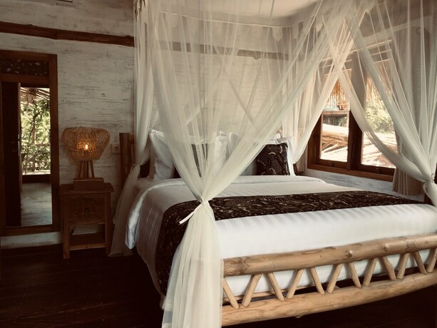 Imagen de la habitación del Hotel The Korowai. Foto 17