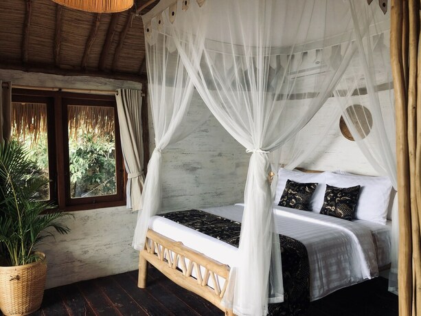 Imagen de la habitación del Hotel The Korowai. Foto 21