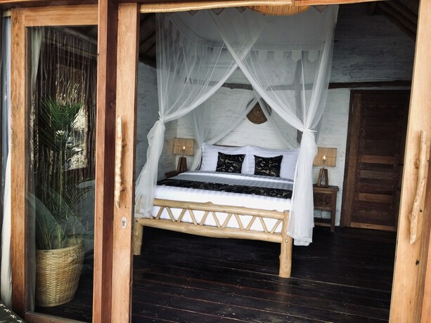 Imagen de la habitación del Hotel The Korowai. Foto 24