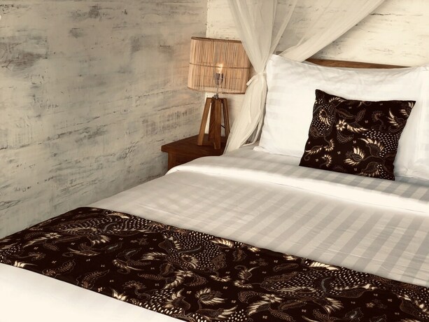 Imagen de la habitación del Hotel The Korowai. Foto 28