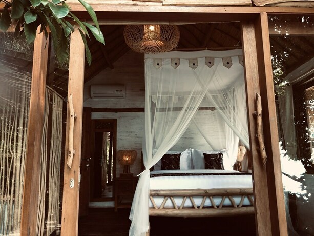 Imagen de la habitación del Hotel The Korowai. Foto 34