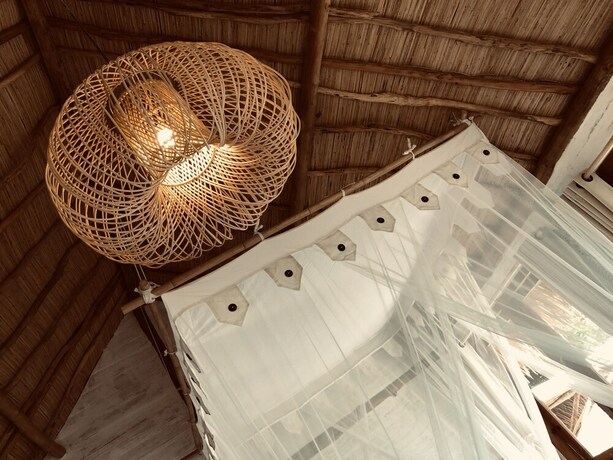 Imagen de la habitación del Hotel The Korowai. Foto 37