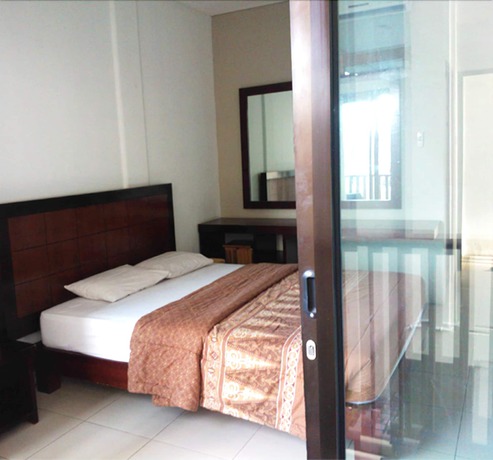 Imagen de la habitación del Hotel The Kubu Hotel. Foto 5