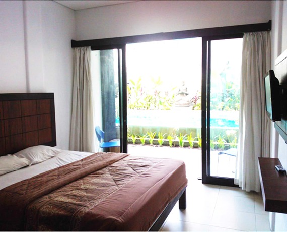 Imagen de la habitación del Hotel The Kubu Hotel. Foto 7