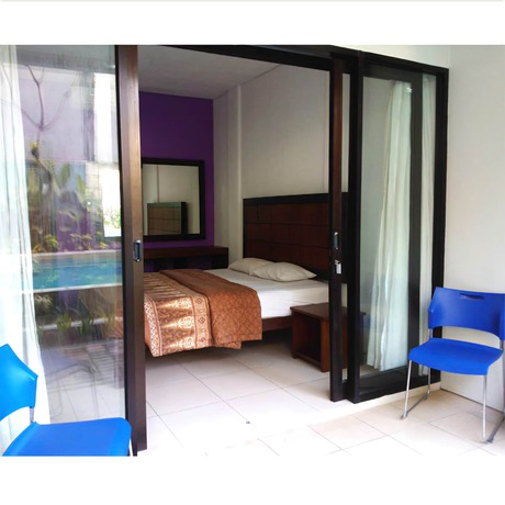 Imagen de la habitación del Hotel The Kubu Hotel. Foto 10