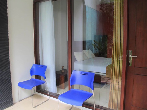 Imagen de la habitación del Hotel The Kubu Hotel. Foto 11