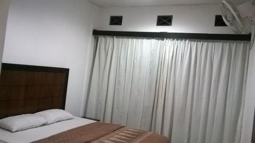 Imagen de la habitación del Hotel The Kubu Hotel. Foto 14