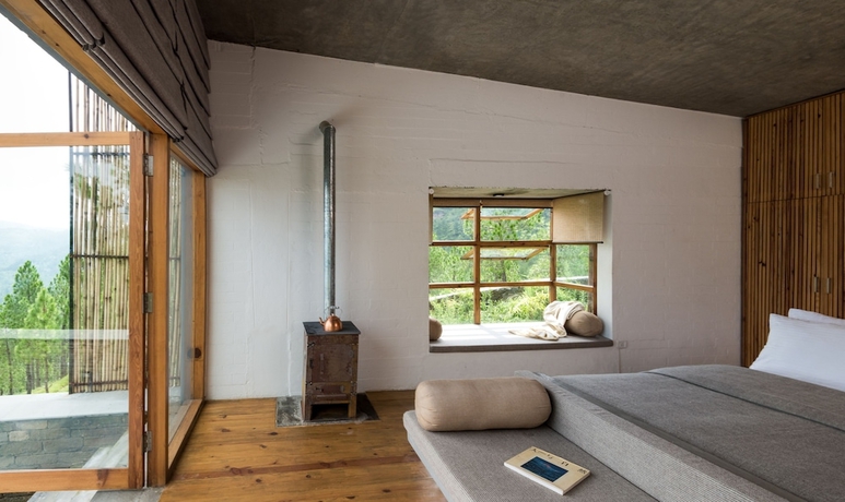 Imagen de la habitación del Hotel The Kumaon. Foto 8