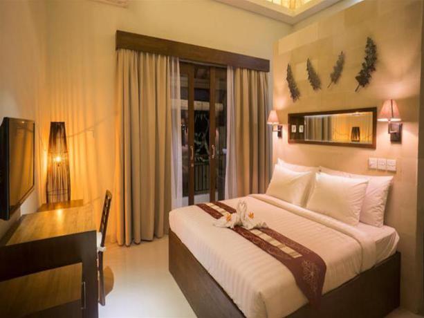 Imagen de la habitación del Hotel The Kumpi Villas, Bali. Foto 6
