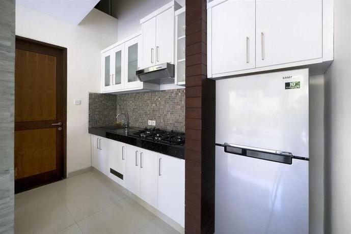 Imagen de la habitación del Hotel The Kumpi Villas, Bali. Foto 8