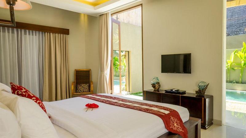 Imagen de la habitación del Hotel The Kumpi Villas, Bali. Foto 10