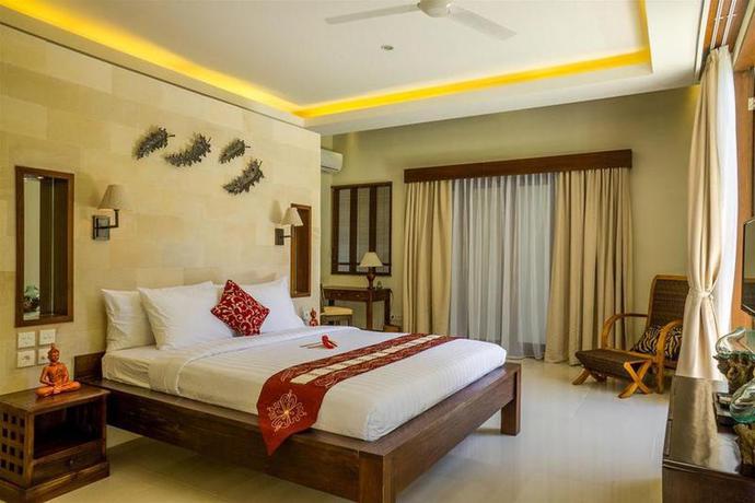 Imagen de la habitación del Hotel The Kumpi Villas, Bali. Foto 13