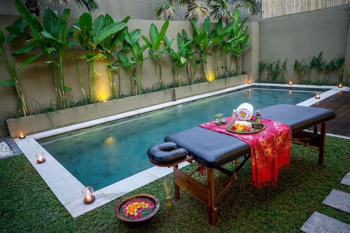 Imagen de la habitación del Hotel The Kumpi Villas, Bali. Foto 14