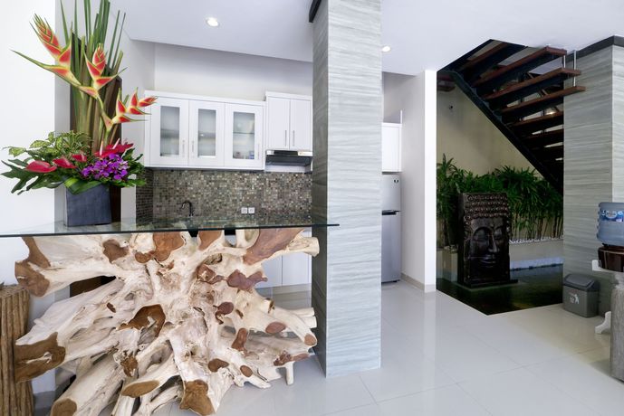 Imagen de la habitación del Hotel The Kumpi Villas. Foto 12