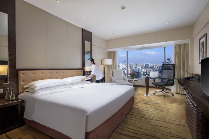 Imagen de la habitación del Hotel The Kunlun Jing An. Foto 4