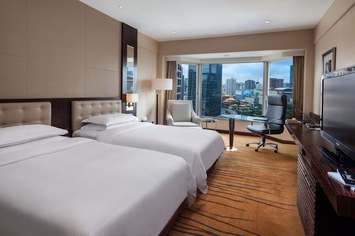 Imagen de la habitación del Hotel The Kunlun Jing An. Foto 11