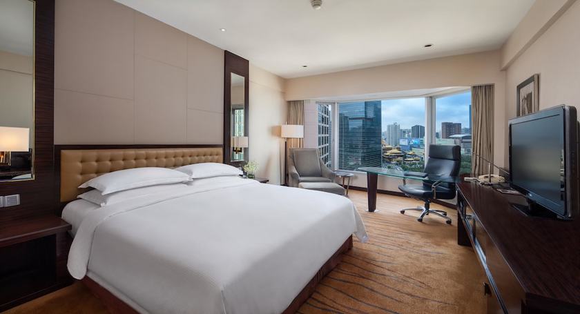 Imagen de la habitación del Hotel The Kunlun Jing An. Foto 13