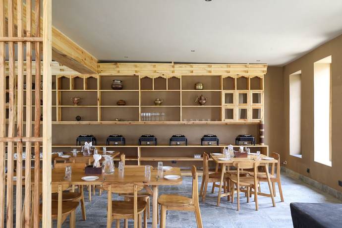 Imagen del bar/restaurante del Hotel The Kyagar. Foto 4