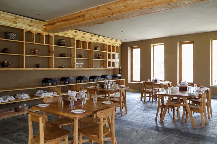 Imagen del bar/restaurante del Hotel The Kyagar. Foto 5
