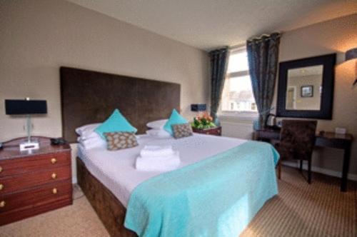 Imagen de la habitación del Hotel The Kylestrome. Foto 3