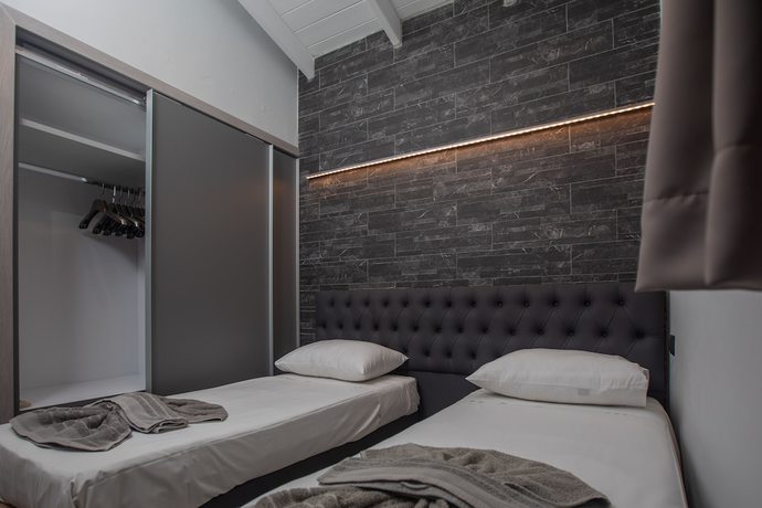 Imagen de la habitación del Hotel The L Suites and Apartments. Foto 9