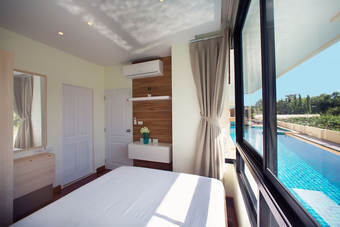 Imagen de la habitación del Hotel The Lago Apartments By Tropiclook. Foto 5