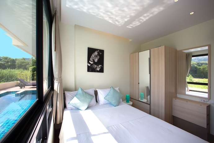 Imagen de la habitación del Hotel The Lago Apartments By Tropiclook. Foto 10