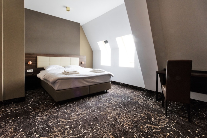 Imagen de la habitación del Hotel The Lake Amsterdam Airport. Foto 7