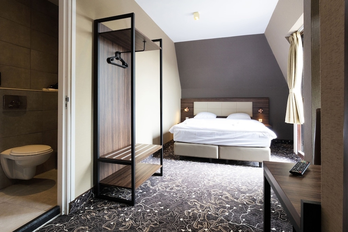 Imagen de la habitación del Hotel The Lake Amsterdam Airport. Foto 11