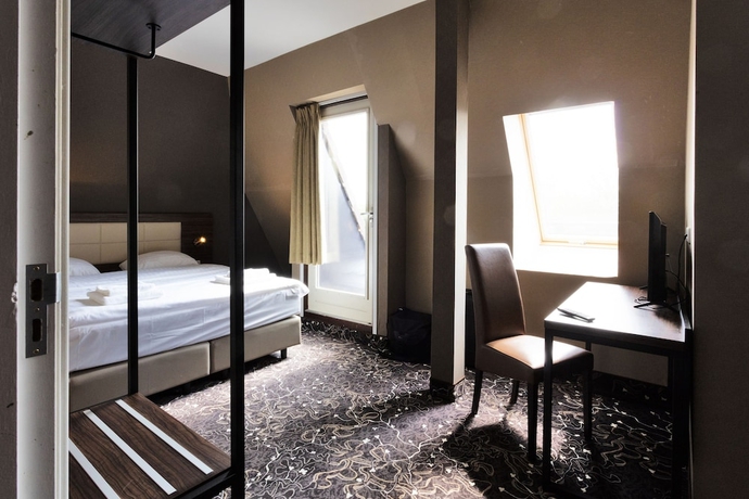 Imagen de la habitación del Hotel The Lake Amsterdam Airport. Foto 12