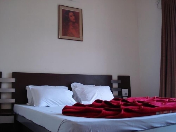 Imagen de la habitación del Hotel The Lake Land Country Club Residency. Foto 6