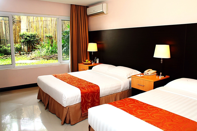 Imagen de la habitación del Hotel The Lake Tagaytay. Foto 11