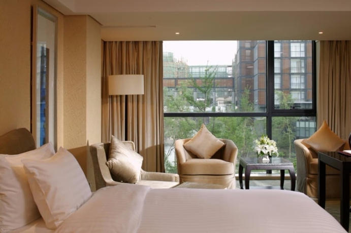 Imagen de la habitación del Hotel The Lake View Beijing. Foto 8