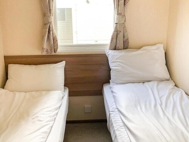 Imagen de la habitación del Hotel The Lakes Rookley. Foto 16