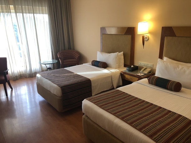 Imagen de la habitación del Hotel The Lalit Ashok Bangalore. Foto 2