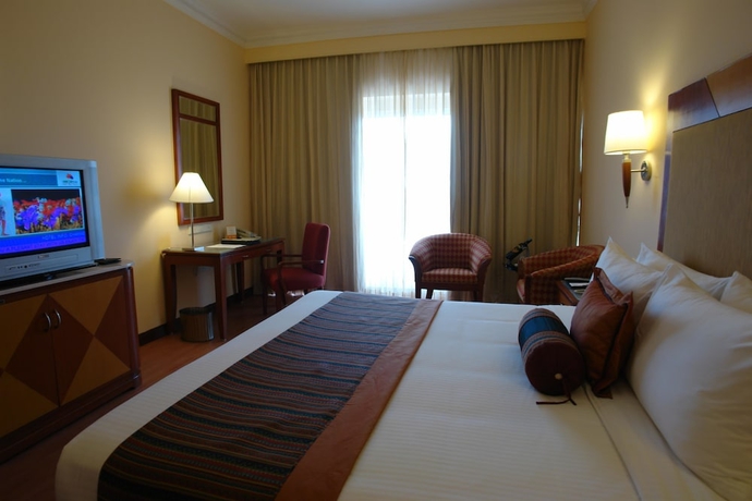 Imagen de la habitación del Hotel The Lalit Ashok Bangalore. Foto 10