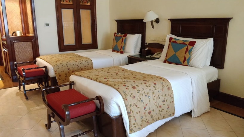 Imagen de la habitación del Hotel The Lalit Golf and Spa Resort Goa. Foto 8