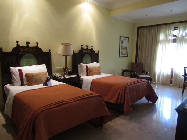 Imagen de la habitación del Hotel The Lalit Golf and Spa Resort Goa. Foto 13