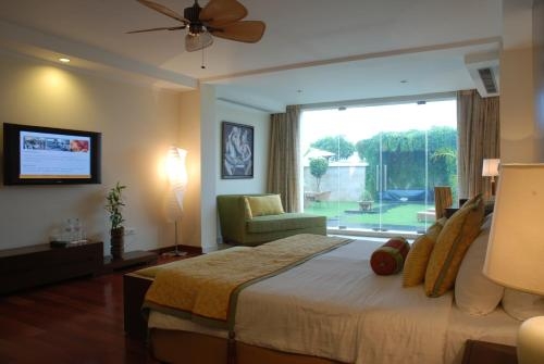 Imagen de la habitación del Hotel The Lalit Temple View Khajuraho. Foto 9