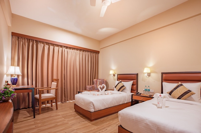 Imagen de la habitación del Hotel The Lalita Grand. Foto 14