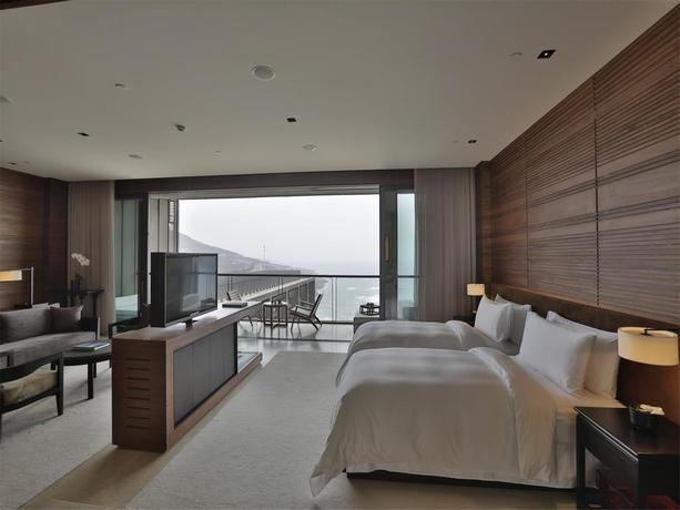 Imagen de la habitación del Hotel The Lalu Qingdao China. Foto 7