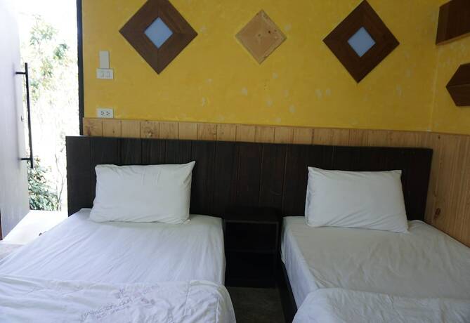 Imagen de la habitación del Hotel The Lampang Villa. Foto 17